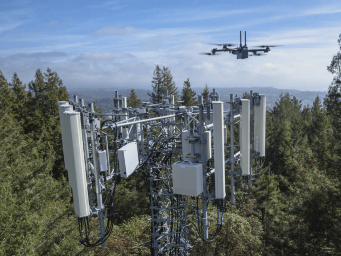 Drone performing close-up inspection of a cellular communications tower